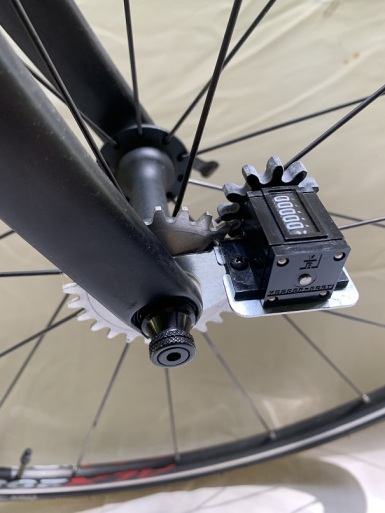 A Jones Counter mounted on a bicycle's front wheel hub